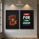 Motivational wall frames pack of 2 with Born to Win and Work for Your Dream quotes in office room