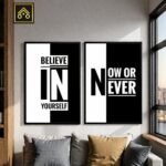 Sticky MDF motivational frame being installed on wall using double-sided adhesive tape, showing easy rental-friendly installation process with no tools required