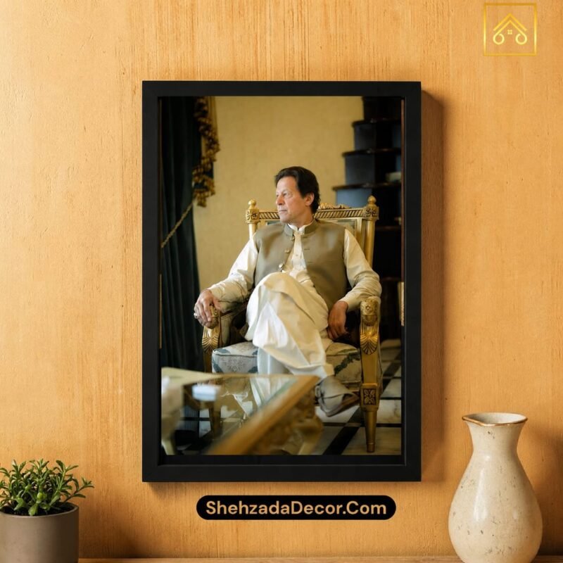 Imran Khan wooden glass photo frame displayed above sofa in modern Pakistani living room with acrylic glass protection – ShehzadaDecor