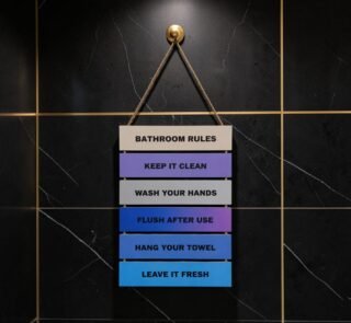 Closeup of ShehzadaDecor bathroom rules printed MDF panel texture